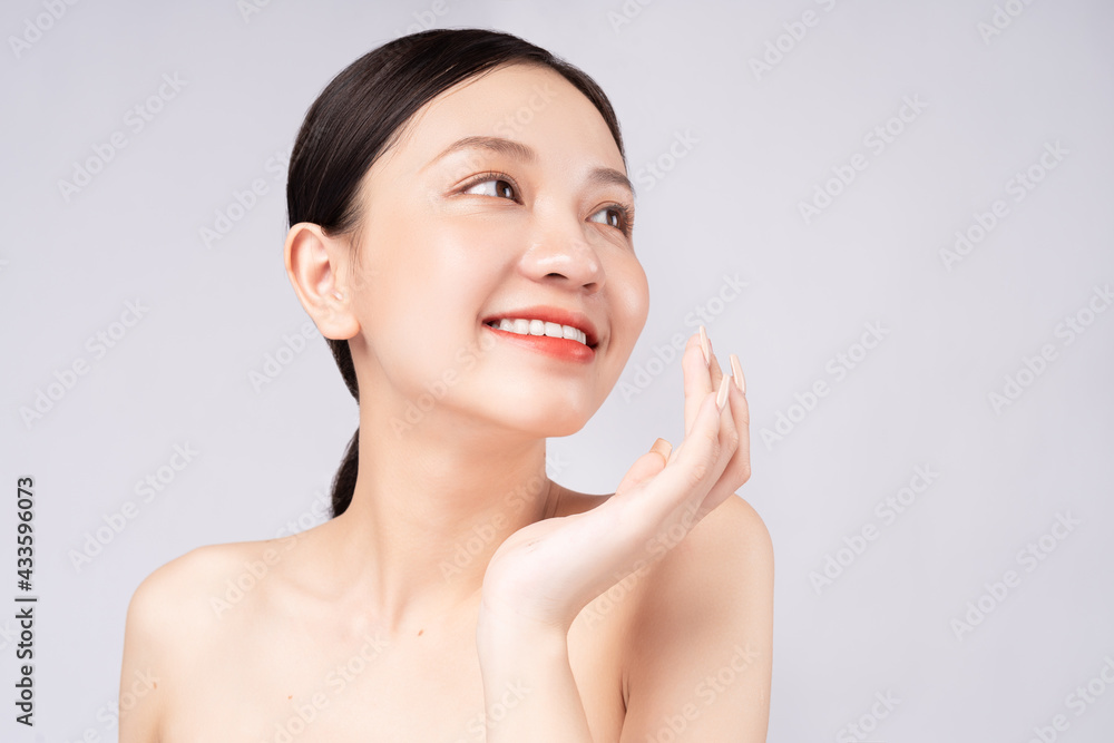 Beautiful Asian woman smiling with beautiful skin Beautiful Asian woman smiling with beautiful skin