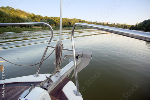Wallpaper Mural Sailing boat on river water at sunset with flare and outdoor lifestyle Torontodigital.ca