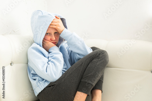 Photos Redhead Caucasian girl got sick, child suffers from flu, runny nose, headache an