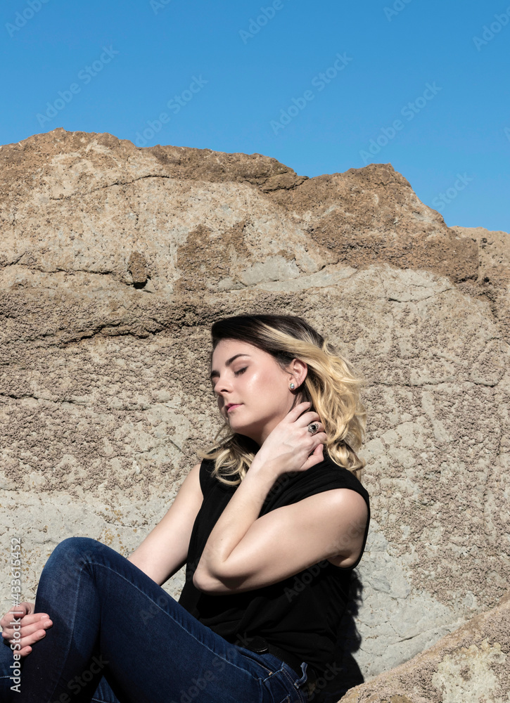 portrait of young woman in a wool sweater outdoors portrait of young woman in a wool sweater outdoors