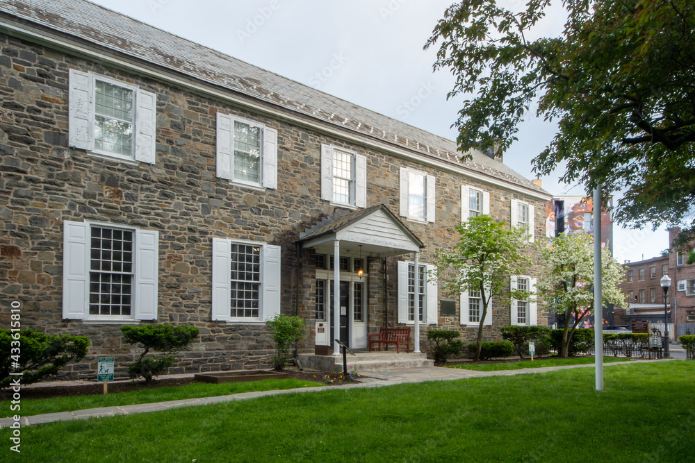 Kingston, NY - USA- May 12, 2021: a landscape view of the The Senate House State Historic site , located in the historic Kingston Stockade District.