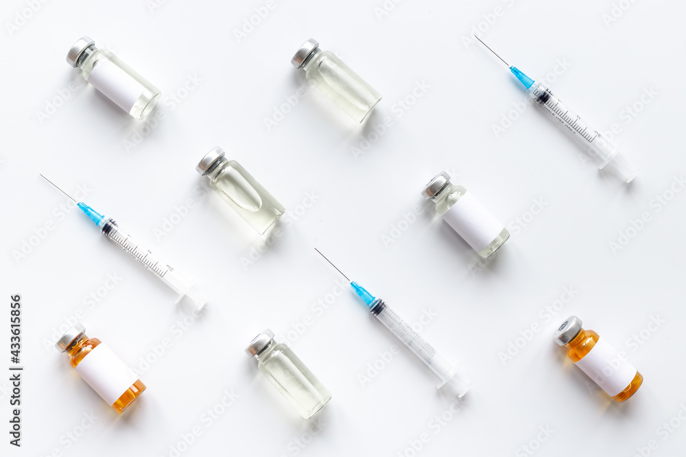 Medical vials with vaccine. Vaccination concept Medical vials with vaccine. Vaccination concept