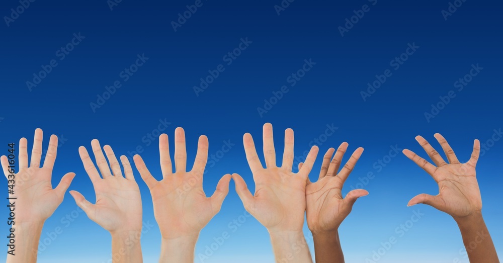 Composition of caucasian hands on the blue background