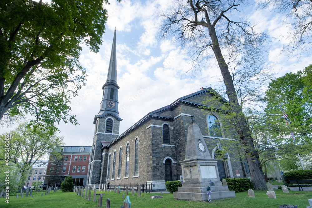 Kingston, NY - USA- May 12, 2021: The Old Dutch Church, a 19th-century bluestone church and cemetery located on Wall Street in the Kingston Stockade District.