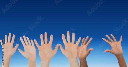 Composition of caucasian hands on the blue background