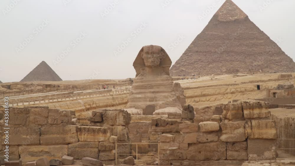 Great Sphinx of Giza, colossal limestone statue of a recumbent sphinx located in Giza, Egypt. It is one of Egypts most famous landmarks Great Sphinx of Giza, colossal limestone statue of a recumbent sphinx located in Giza, Egypt. It is one of Egypts most famous landmarks