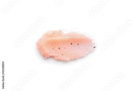 Smear of pink body scrub isolated on white, top view