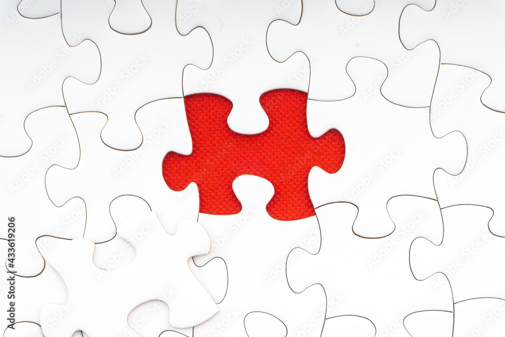 Red jigsaw puzzle pieces on red background. Copy space and business concept Red jigsaw puzzle pieces on red background. Copy space and business concept