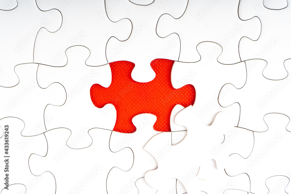 Red jigsaw puzzle pieces on red background. Copy space and business concept Red jigsaw puzzle pieces on red background. Copy space and business concept