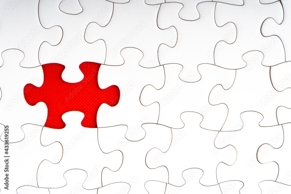 Red jigsaw puzzle pieces on red background. Copy space and business concept Red jigsaw puzzle pieces on red background. Copy space and business concept