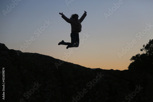 Wallpaper Mural silhouettes of people in the mountain with sunrise sky background Torontodigital.ca