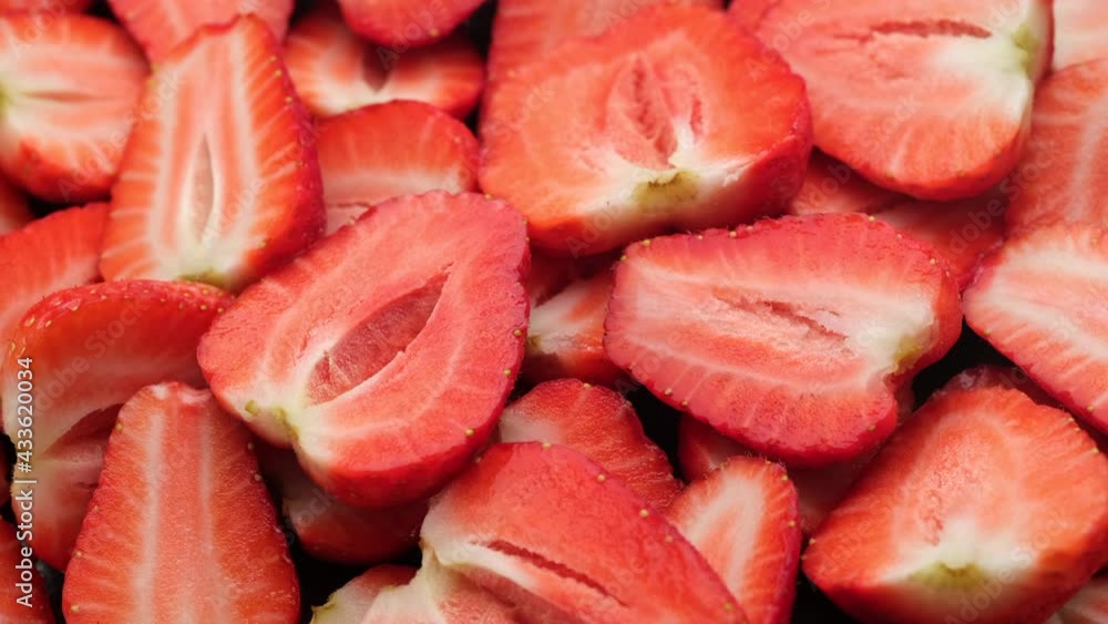 sliced fresh strawberry close up, rotate. Summer Dessert. 4K UHD video sliced fresh strawberry close up, rotate. Summer Dessert. 4K UHD video
