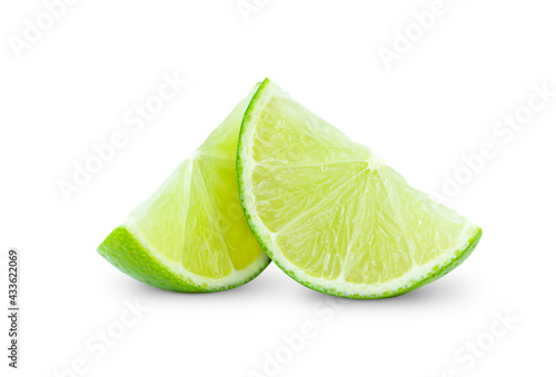 Slices of lime isolated on white background