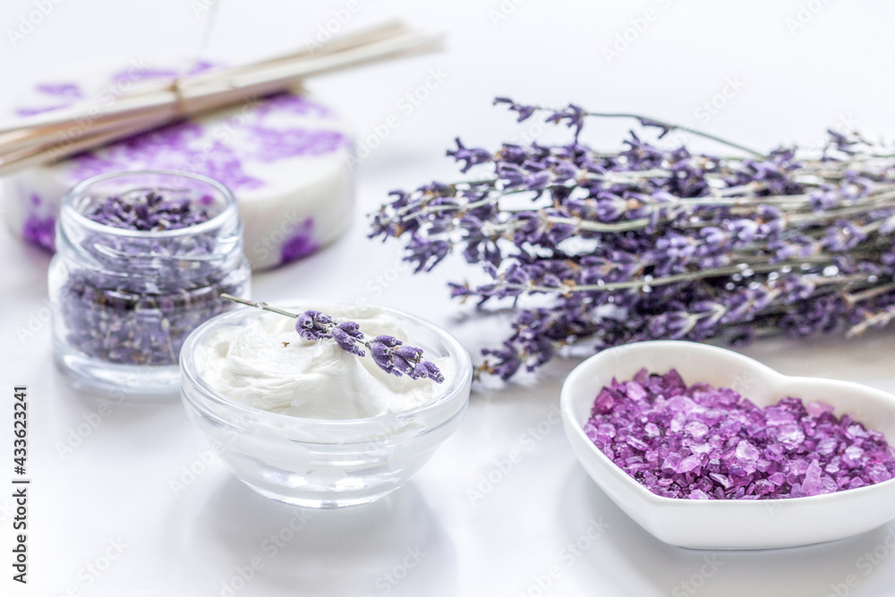 natural herb cosmetic with lavender flowers flatlay on white background natural herb cosmetic with lavender flowers flatlay on white background