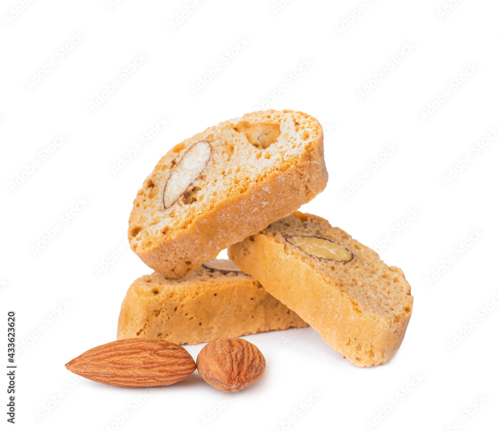 Slices of tasty cantucci and nuts on white background. Traditional Italian almond biscuits Slices of tasty cantucci and nuts on white background. Traditional Italian almond biscuits