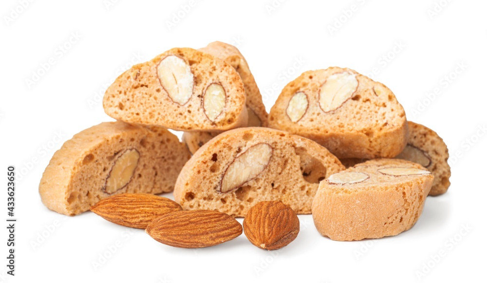 Slices of tasty cantucci and nuts on white background. Traditional Italian almond biscuits Slices of tasty cantucci and nuts on white background. Traditional Italian almond biscuits