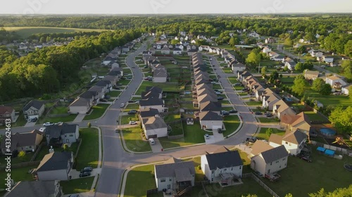 Beautiful overhead aerial footage of suburbs in Clarksville, Tennessee during golden hour photo