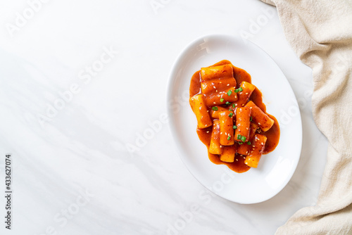 Korean rice cake stick in spicy sauce - Tteokbokki photo