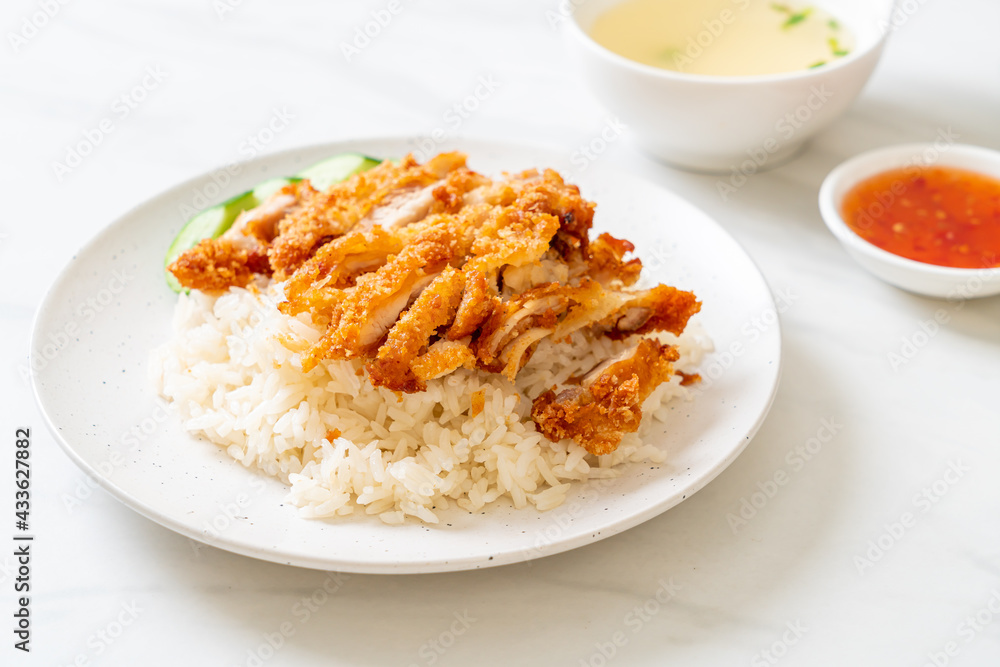 Hainanese chicken rice with fried chicken Hainanese chicken rice with fried chicken