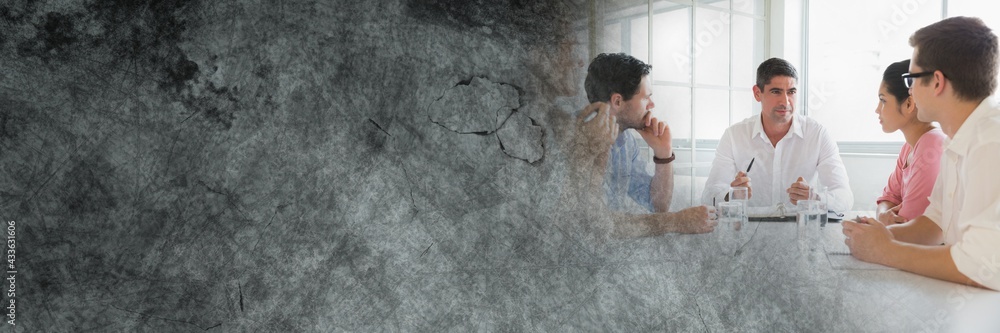 Fototapeta premium Composition of business people meeting in office and distressed background