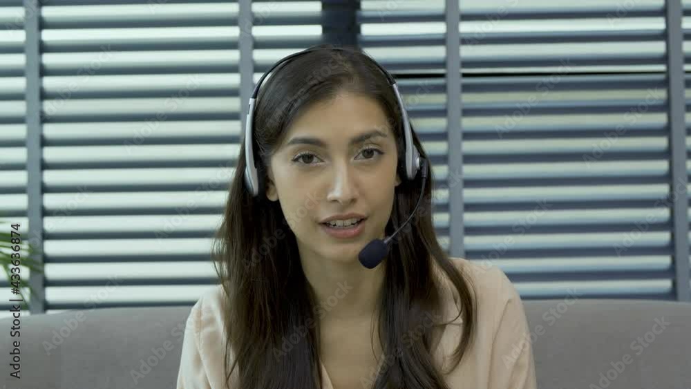 Portrait of beautiful live streaming podcast at home. She using microphone to work at room. Portrait of beautiful live streaming podcast at home. She using microphone to work at room.