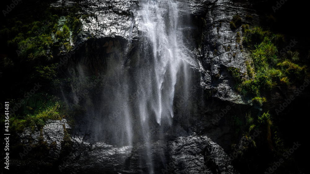 Stream of fresh water pouring down through the rocks in a tropical forest, natural beauty of the mother earth concept, Diyaluma falls in Koslanda, Badulla. the second-highest waterfall in Sri Lanka. Stream of fresh water pouring down through the rocks in a tropical forest, natural beauty of the mother earth concept, Diyaluma falls in Koslanda, Badulla. the second-highest waterfall in Sri Lanka.