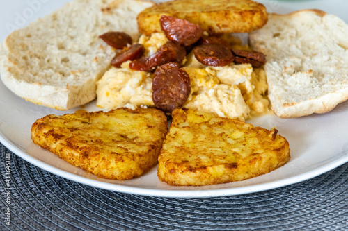 Breakfast plate of hash browns with other items