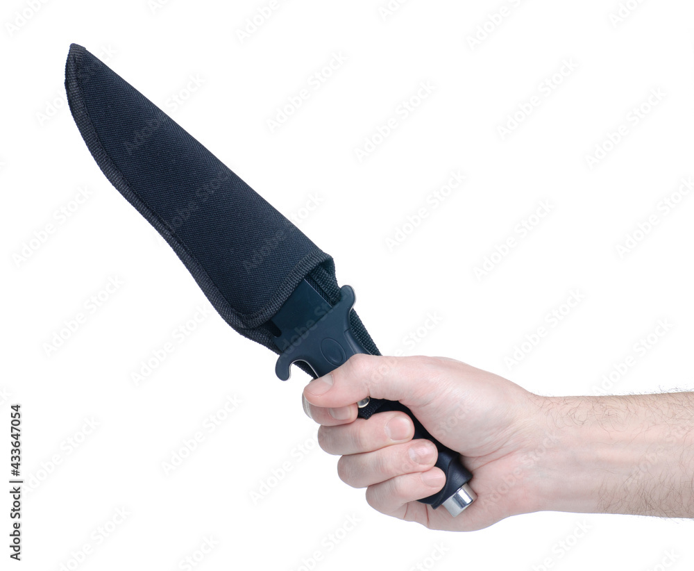 Male holding hunting knife in case on white background isolation Male holding hunting knife in case on white background isolation