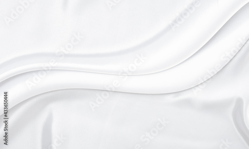 White gray satin texture that is white silver fabric silk background with beautiful soft blur pattern natural.