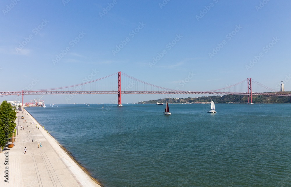 Fototapeta premium Bridge of 25th of April, Tagus river, Lisbon, Portugal
