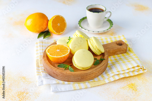 Lemon macaroons with fresh fruits.
