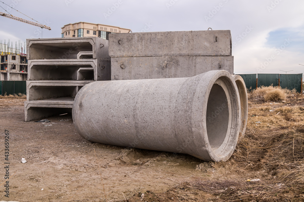 Reinforced concrete pipes at a construction site. Reinforced concrete pipes at a construction site.