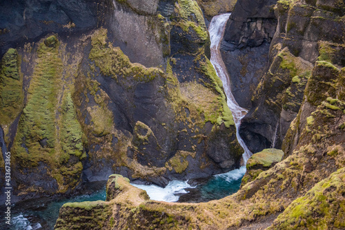 Fototapeta Fjaðrárgljúfur, Iceland mossy green canyon with breathtaking views