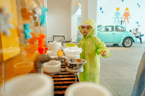 Photography Dubai, UAE - MARCH, 2021: Little girl playing in Oli Oli Dubai's experiential pl