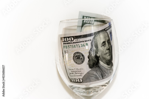 dollars in a glass
