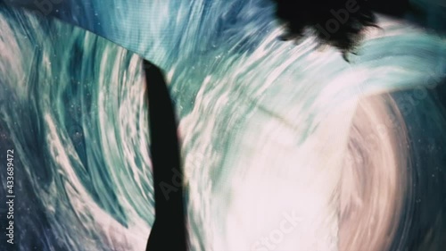 Nature whirlpool. Dancing woman. Vitality energy. Freedom mind. Trance harmony. Back view silhouette lady moving on blue white water flow spiral projection double exposure. photo