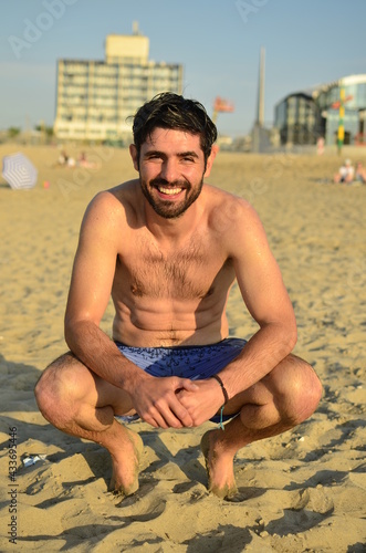 Man smiling on the beach
