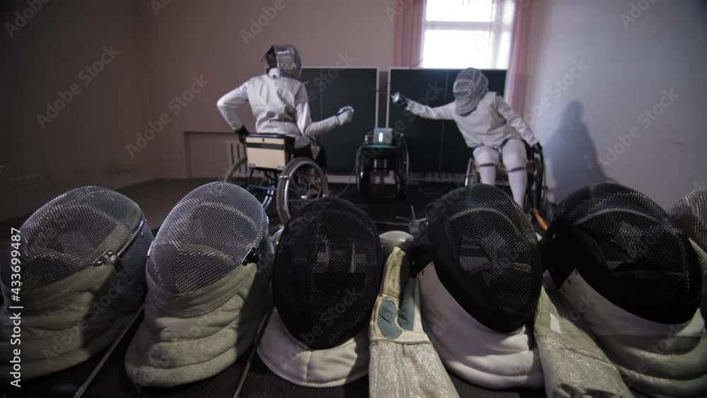 disabled athlete. fencing. equipment for fencing, helmets, masks and
