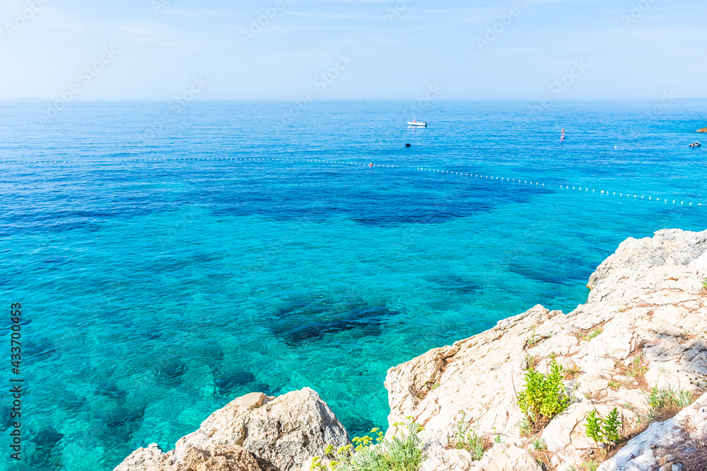 Cliffs over the Adriatic Sea next to Jagodna Beach, Hvar, Croatia