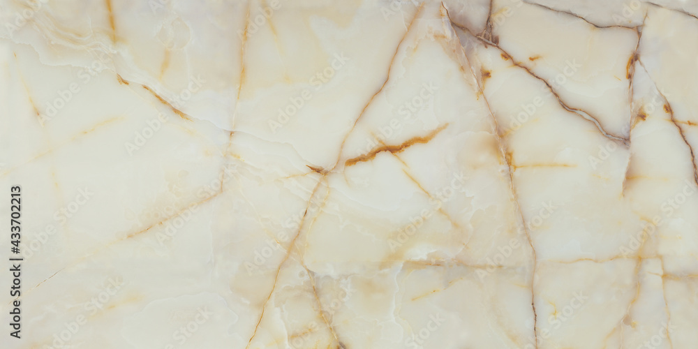 Brown fine-grained marble background on beige background