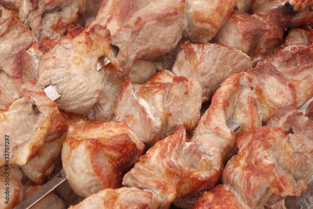 Grilled Meat Skewers. Many Shish Kebab. Cookout Food Background. Marinated Shashlik Or Shish Kebab Grilling On Skewers. Shish Kebab Roasting On Hot grill. BBQ Family Party Background. Grilled Meat Skewers. Many Shish Kebab. Cookout Food Background. Marinated Shashlik Or Shish Kebab Grilling On Skewers. Shish Kebab Roasting On Hot grill. BBQ Family Party Background.