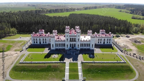 View on the old castle-palace Puslovsky, national landmark. Kossovo, Belarus. Aerial video 4K photo