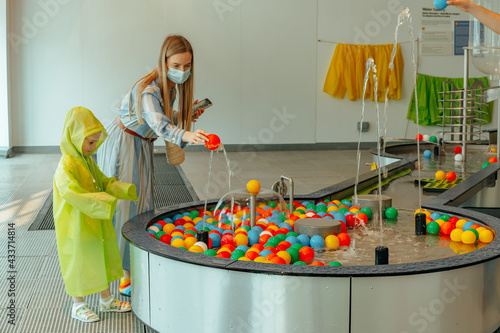 Canvas Print Dubai, UAE - MARCH, 2021: Little girl playing in Oli Oli Dubai's experiential pl