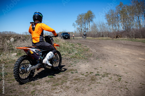 Motocross rider gets ready to hit the track.