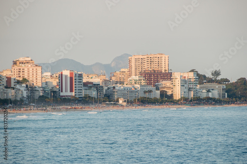 sunset at leblon beach in rio de janeiro.