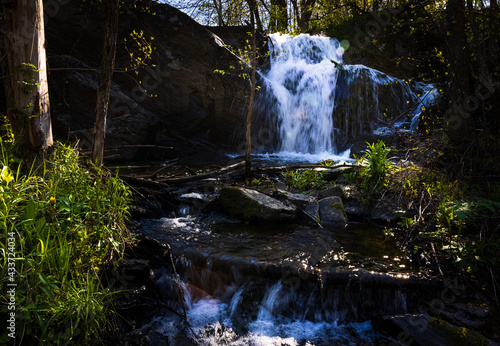 Spring waterfall in the Canadian forest. photo