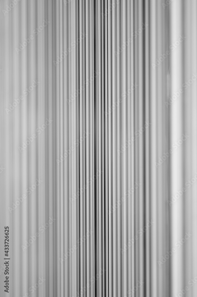 Merging Vertical Lines Black and White Background (focus on the center line) Merging Vertical Lines Black and White Background (focus on the center line)
