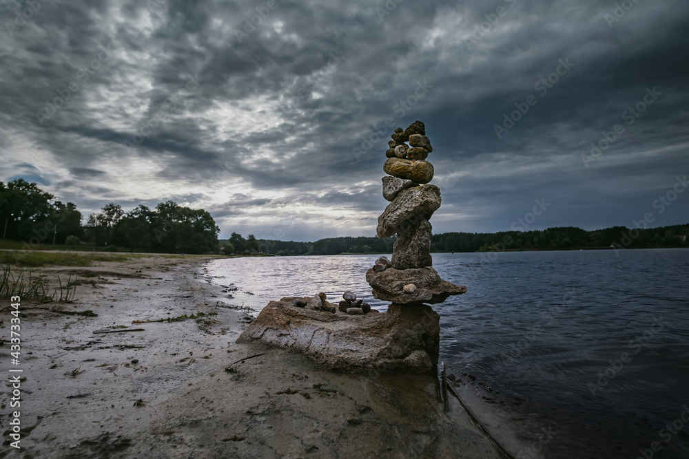 stone arrange in balance in the bank of the river