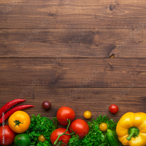 Selection of fresh products for preparing healthy and delicious vegetarian and vegan food. Various vegetables and fruits lie on the table. Flat lay.