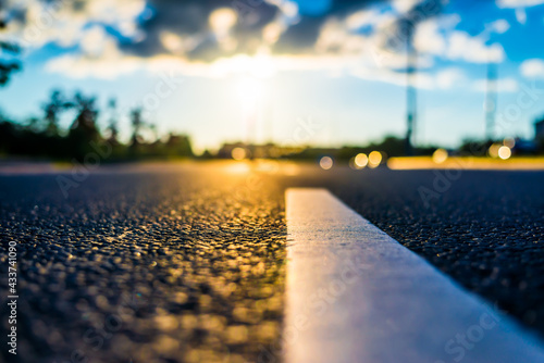 Fotografie Sunset after rain, the empty highway